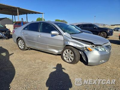 Czwarte zdjęcie samochodu z boku: 2009 TOYOTA CAMRY HYBRID VIN:4T1BB46KX9U080461 - miniatura