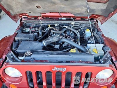 Zdjęcie 11 z 12 samochodu: 2008 JEEP WRANGLER UNLIMITED SAHARA VIN:1J4GA59188L531438 - miniatura