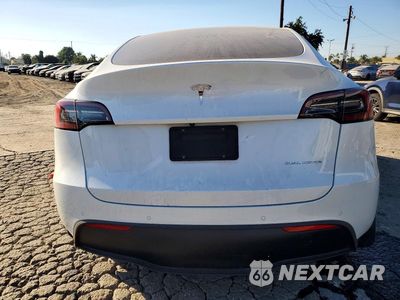 Zdjęcie 6 z 12 samochodu: 2022 TESLA MODEL Y VIN:7SAYGAEE7NF433478 - miniatura