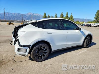 Trzecie zdjęcie samochodu z tyłu: 2021 TESLA MODEL Y VIN:5YJYGDEE9MF258969 - miniatura