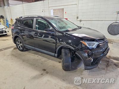 Czwarte zdjęcie samochodu z boku: 2017 TOYOTA RAV4 XLE VIN:2T3RFREV2HW631595 - miniatura