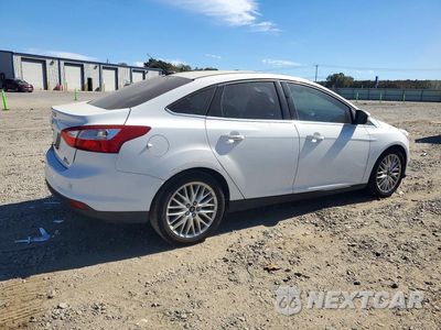 Trzecie zdjęcie samochodu z tyłu: 2012 FORD FOCUS SEL VIN:1FAHP3H24CL386758 - miniatura