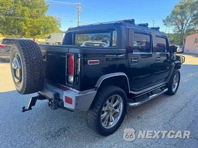 Czwarte zdjęcie samochodu z boku: 2005 HUMMER H2 SUT VIN:5GRGN22U85H109373 - miniatura