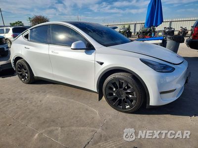 Czwarte zdjęcie samochodu z boku: 2023 TESLA MODEL Y VIN:7SAYGDEE5PA118647 - miniatura