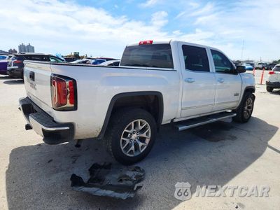 Trzecie zdjęcie samochodu z tyłu: 2018 GMC SIERRA K1500 SLT VIN:3GTU2NEC0JG619349 - miniatura