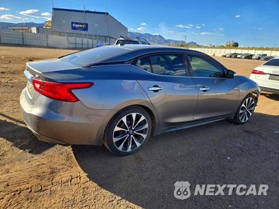 Trzecie zdjęcie samochodu z tyłu: 2016 NISSAN MAXIMA 3.5 SR VIN:1N4AA6AP3GC379400 - miniatura