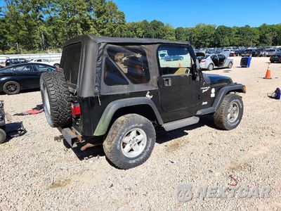 Trzecie zdjęcie samochodu z tyłu: 1998 JEEP WRANGLER / TJ SPORT VIN:1J4FY19S1WP705624 - miniatura
