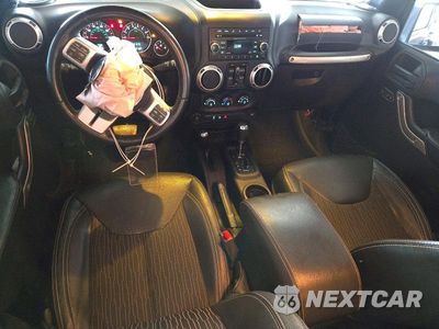 Zdjęcie 8 z 13 samochodu: 2015 JEEP WRANGLER UNLIMITED SPORT VIN:1C4HJWDG2FL631821 - miniatura