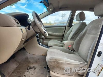 Zdjęcie 7 z 12 samochodu: 2004 TOYOTA COROLLA CE VIN:1NXBR32E44Z330307 - miniatura