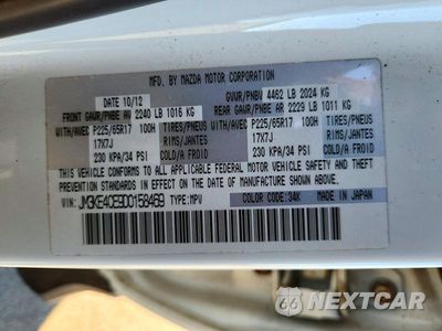 Zdjęcie 12 z 12 samochodu: 2013 MAZDA CX-5 TOURING VIN:JM3KE4CE9D0158469 - miniatura