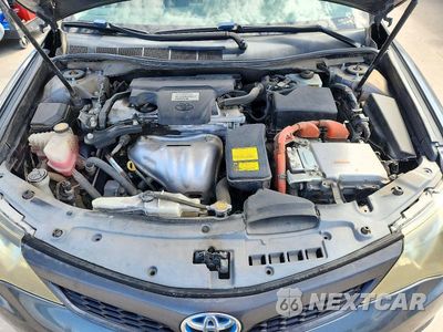 Zdjęcie 11 z 12 samochodu: 2014 TOYOTA CAMRY HYBRID SE VIN:4T1BD1FK4EU122044 - miniatura