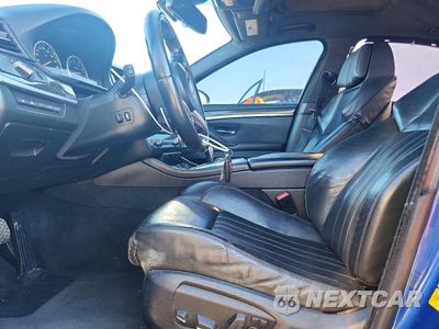 Zdjęcie 7 z 12 samochodu: 2016 BMW M5 VIN:WBSFV9C52GG343362 - miniatura