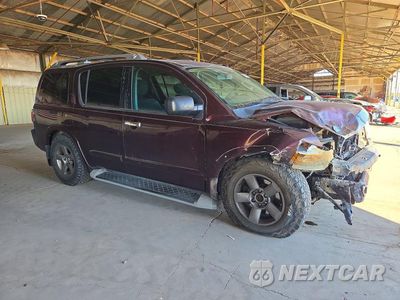 Czwarte zdjęcie samochodu z boku: 2014 NISSAN ARMADA SV VIN:5N1BA0ND0EN610407 - miniatura