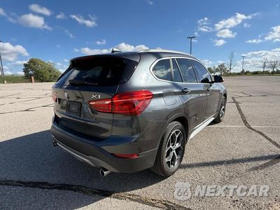 Czwarte zdjęcie samochodu z boku: 2018 BMW X1 SDRIVE28I VIN:WBXHU7C36J5L04902 - miniatura