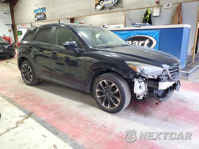 Czwarte zdjęcie samochodu z boku: 2016 MAZDA CX-5 GT VIN:JM3KE4DY9G0692407 - miniatura