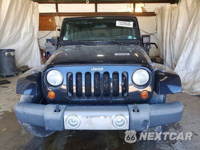 Piąte zdjęcie samochodu w środku: 2012 JEEP WRANGLER UNLIMITED SAHARA VIN:1C4BJWEG5CL276093 - miniatura