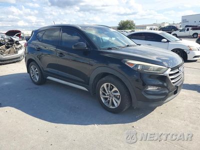 Czwarte zdjęcie samochodu z boku: 2017 HYUNDAI TUCSON SE VIN:KM8J33A44HU469039 - miniatura