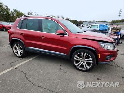 Czwarte zdjęcie samochodu z boku: 2013 VOLKSWAGEN TIGUAN S VIN:WVGBV3AX9DW062535 - miniatura