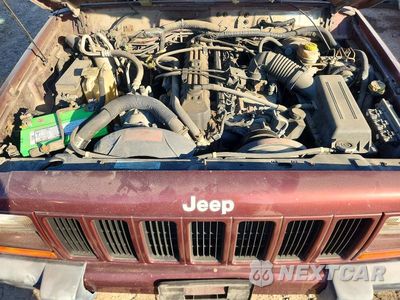 Zdjęcie 11 z 12 samochodu: 2000 JEEP CHEROKEE SPORT VIN:1J4FF48S5YL247105 - miniatura