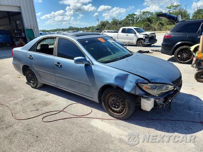 Czwarte zdjęcie samochodu z boku: 2002 TOYOTA CAMRY LE VIN:4T1BE32K12U595748 - miniatura