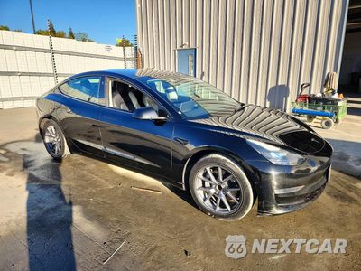 Czwarte zdjęcie samochodu z boku: 2022 TESLA MODEL 3 VIN:5YJ3E1EA5NF291271 - miniatura