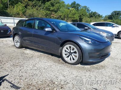 Czwarte zdjęcie samochodu z boku: 2023 TESLA MODEL 3 VIN:5YJ3E1EA1PF435871 - miniatura