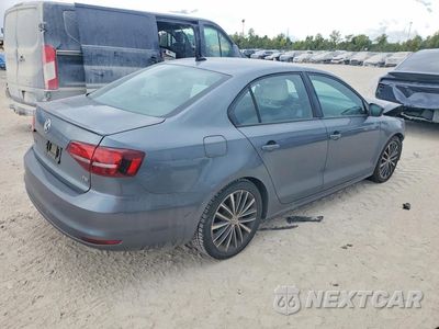 Trzecie zdjęcie samochodu z tyłu: 2016 VOLKSWAGEN JETTA SPORT VIN:3VWD17AJ6GM357931 - miniatura