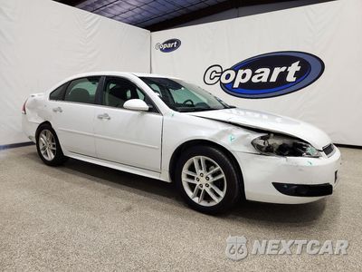 Czwarte zdjęcie samochodu z boku: 2014 CHEVROLET IMPALA LIMITED LTZ VIN:2G1WC5E39E1183078 - miniatura