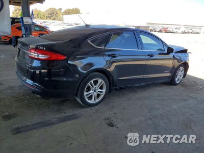 Trzecie zdjęcie samochodu z tyłu: 2018 FORD FUSION SE HYBRID VIN:3FA6P0LU2JR206934 - miniatura