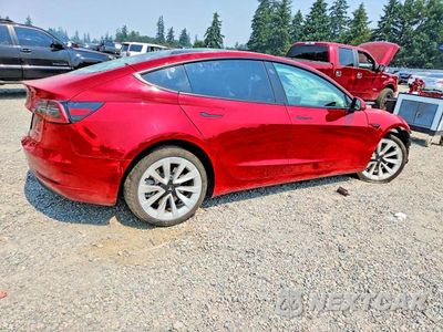 Trzecie zdjęcie samochodu z tyłu: 2022 TESLA MODEL 3 VIN:5YJ3E1EB1NF12969X - miniatura