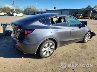 Trzecie zdjęcie samochodu z tyłu: 2023 TESLA MODEL Y VIN:7SAYGDEE7PA209760 - miniatura