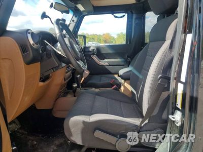 Zdjęcie 7 z 14 samochodu: 2011 JEEP WRANGLER UNLIMITED SAHARA VIN:1J4BA5H16BL526581 - miniatura