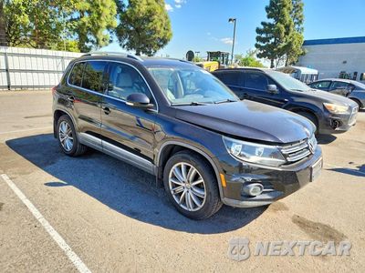 Czwarte zdjęcie samochodu z boku: 2012 VOLKSWAGEN TIGUAN S VIN:WVGAV7AX3CW532026 - miniatura