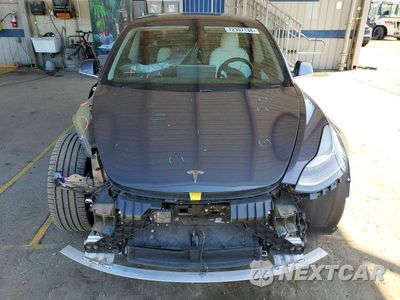 Piąte zdjęcie samochodu w środku: 2019 TESLA MODEL 3 VIN:5YJ3E1EA7KF345455 - miniatura