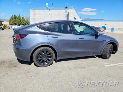 Trzecie zdjęcie samochodu z tyłu: 2021 TESLA MODEL Y VIN:5YJYGDED2MF124392 - miniatura