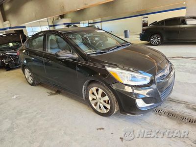 Czwarte zdjęcie samochodu z boku: 2014 HYUNDAI ACCENT GLS VIN:KMHCU4AE9EU625270 - miniatura