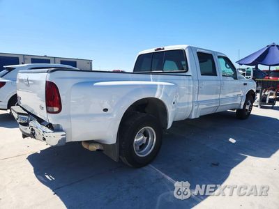 Trzecie zdjęcie samochodu z tyłu: 2002 FORD F350 SUPER DUTY VIN:1FTWW32F32EA82341 - miniatura
