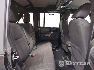 Zdjęcie 10 z 12 samochodu: 2015 JEEP WRANGLER UNLIMITED SPORT VIN:1C4BJWDG0FL524210 - miniatura