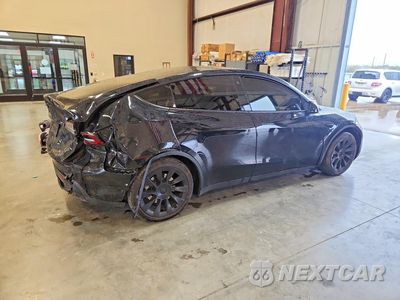 Trzecie zdjęcie samochodu z tyłu: 2023 TESLA MODEL Y VIN:7SAYGAEE2PF592105 - miniatura