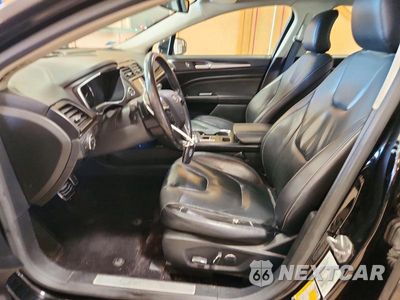 Zdjęcie 7 z 12 samochodu: 2017 FORD FUSION TITANIUM VIN:3FA6P0D94HR211007 - miniatura