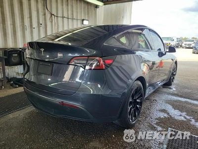 Czwarte zdjęcie samochodu z boku: 2022 TESLA MODEL Y VIN:7SAYGDEE1NF387017 - miniatura