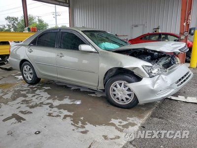 Czwarte zdjęcie samochodu z boku: 2002 TOYOTA CAMRY XLE VIN:4T1BE32K12U058488 - miniatura