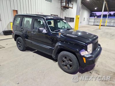 Czwarte zdjęcie samochodu z boku: 2011 JEEP LIBERTY SPORT VIN:1J4PN2GK6BW540563 - miniatura