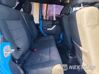 Zdjęcie 11 z 13 samochodu: 2011 JEEP WRANGLER UNLIMITED SAHARA VIN:1J4BA5H16BL600159 - miniatura