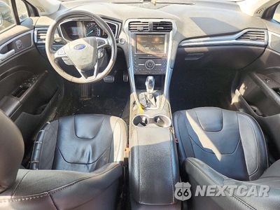 Zdjęcie 8 z 12 samochodu: 2016 FORD FUSION TITANIUM PHEV VIN:3FA6P0SU2GR286505 - miniatura