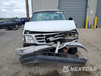 Piąte zdjęcie samochodu w środku: 1999 FORD F150 VIN:1FTZF1727XNA39264 - miniatura