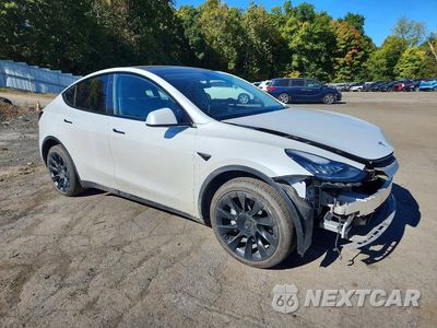 Czwarte zdjęcie samochodu z boku: 2023 TESLA MODEL Y VIN:7SAYDGEE9PA080209 - miniatura