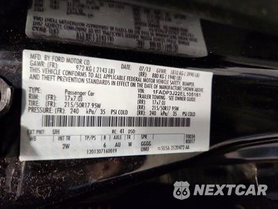Zdjęcie 12 z 12 samochodu: 2014 FORD FOCUS TITANIUM VIN:1FADP3J22EL105181 - miniatura