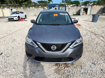 Piąte zdjęcie samochodu w środku: 2018 NISSAN SENTRA S VIN:3N1AB7AP8JY328165 - miniatura