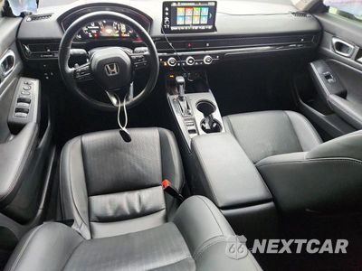 Zdjęcie 8 z 12 samochodu: 2024 HONDA CIVIC TOURING VIN:2HGFE1F99RH310570 - miniatura